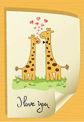 Image showing Funny giraffe couple in love