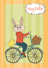 Image showing Easter bunny with a basket of Easter eggs