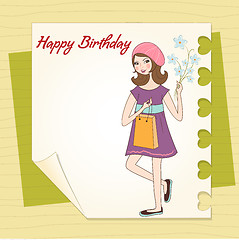 Image showing pretty girl with gift and flowers. birthday card