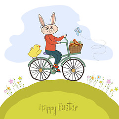 Image showing Easter bunny with a basket of Easter eggs