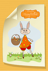 Image showing Easter bunny with a basket of Easter eggs