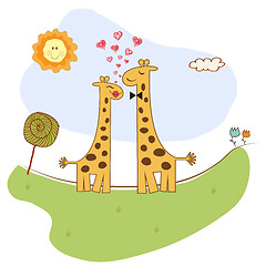 Image showing Funny giraffe couple in love