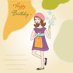 Image showing pretty girl with gift and flowers. birthday card