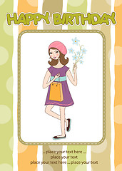 Image showing pretty girl with gift and flowers. birthday card