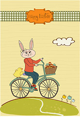 Image showing Easter bunny with a basket of Easter eggs