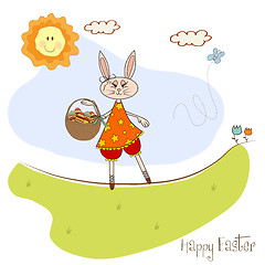 Image showing Easter bunny with a basket of Easter eggs