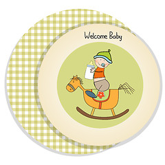 Image showing baby boy shower shower with wood horse toy