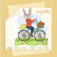 Image showing Easter bunny with a basket of Easter eggs