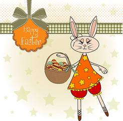 Image showing Easter bunny with a basket of Easter eggs