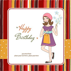 Image showing pretty girl with gift and flowers. birthday card