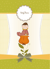 Image showing greeting card with a baby sitting on a flower