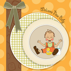 Image showing baby boy playing with his duck toy, welcome baby card