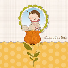 Image showing greeting card with a baby sitting on a flower