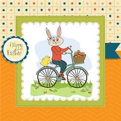 Image showing Easter bunny with a basket of Easter eggs