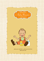 Image showing baby boy playing with his duck toy, welcome baby card