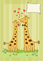 Image showing Funny giraffe couple in love