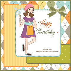 Image showing pretty girl with gift and flowers. birthday card