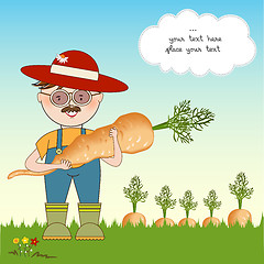 Image showing gardener to harvest carrots