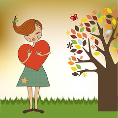 Image showing romantic young girl with big heart