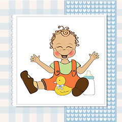 Image showing baby boy playing with his duck toy, welcome baby card