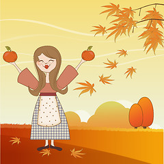 Image showing autumn girl with apples and pumpkins