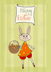 Image showing Easter bunny with a basket of Easter eggs