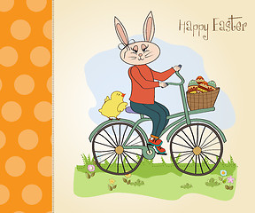 Image showing Easter bunny with a basket of Easter eggs