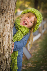 Image showing Portrait of Cute Young Girl Wearing Green Scarf and Hat