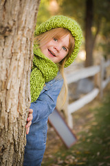 Image showing Portrait of Cute Young Girl Wearing Green Scarf and Hat