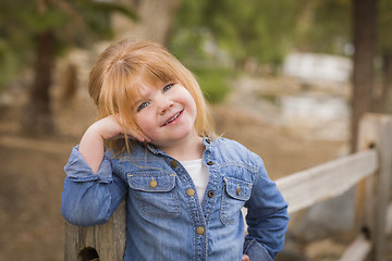 Image showing Cute Young Girl Posing for a Portrait Outside