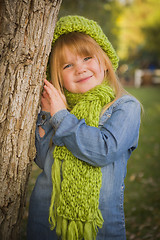 Image showing Portrait of Cute Young Girl Wearing Green Scarf and Hat