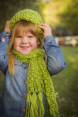 Image showing Portrait of Cute Young Girl Wearing Green Scarf and Hat
