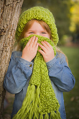 Image showing Portrait of Cute Young Girl Wearing Green Scarf and Hat