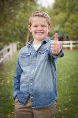 Image showing Handsome Young Boy Giving the Thumbs Up