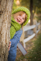 Image showing Portrait of Cute Young Girl Wearing Green Scarf and Hat