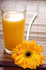 Image showing Orange Juice and Flower