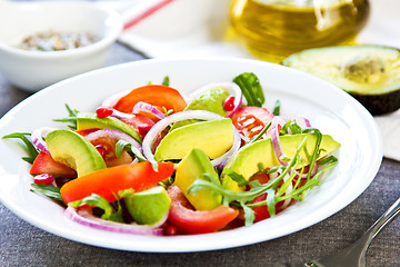 Image showing Avocado with Pomegranate and Rocket salad