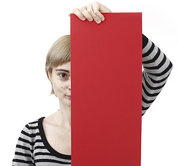 Image showing Woman holding a paper