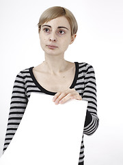 Image showing Woman holding a paper