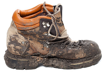 Image showing Old dirty trekking boot. Side view.