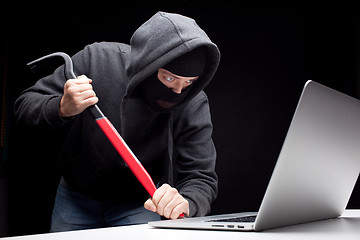 Image showing Computer hacker in a balaclava