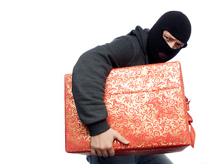 Image showing  bandit holding a wrapped Christmas gift