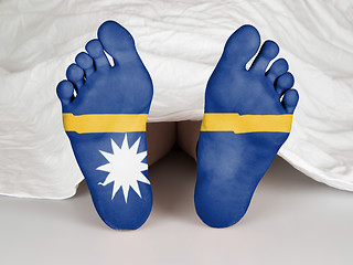 Image showing Feet with flag