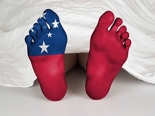 Image showing Feet with flag