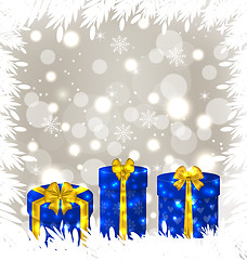 Image showing Christmas gift boxes on glowing background