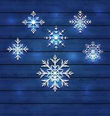 Image showing Christmas set variation snowflakes on wooden background