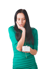 Image showing Pretty girl holding white box with gift