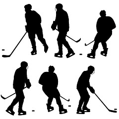 Image showing Set of silhouettes of hockey player. Isolated on white. Vector  