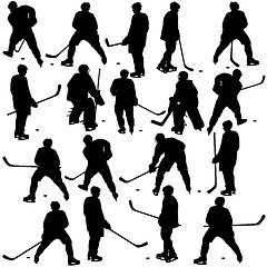 Image showing Set of silhouettes of hockey player. Isolated on white. Vector  