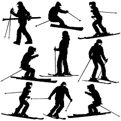 Image showing Mountain skier   woman speeding down slope. Vector sport silhoue